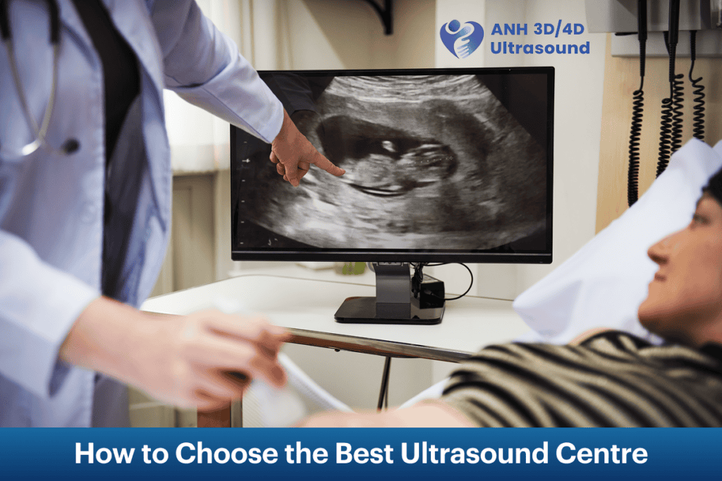 Doctor showing a pregnancy ultrasound scan on a monitor to a patient, explaining how to choose the best ultrasound centre.